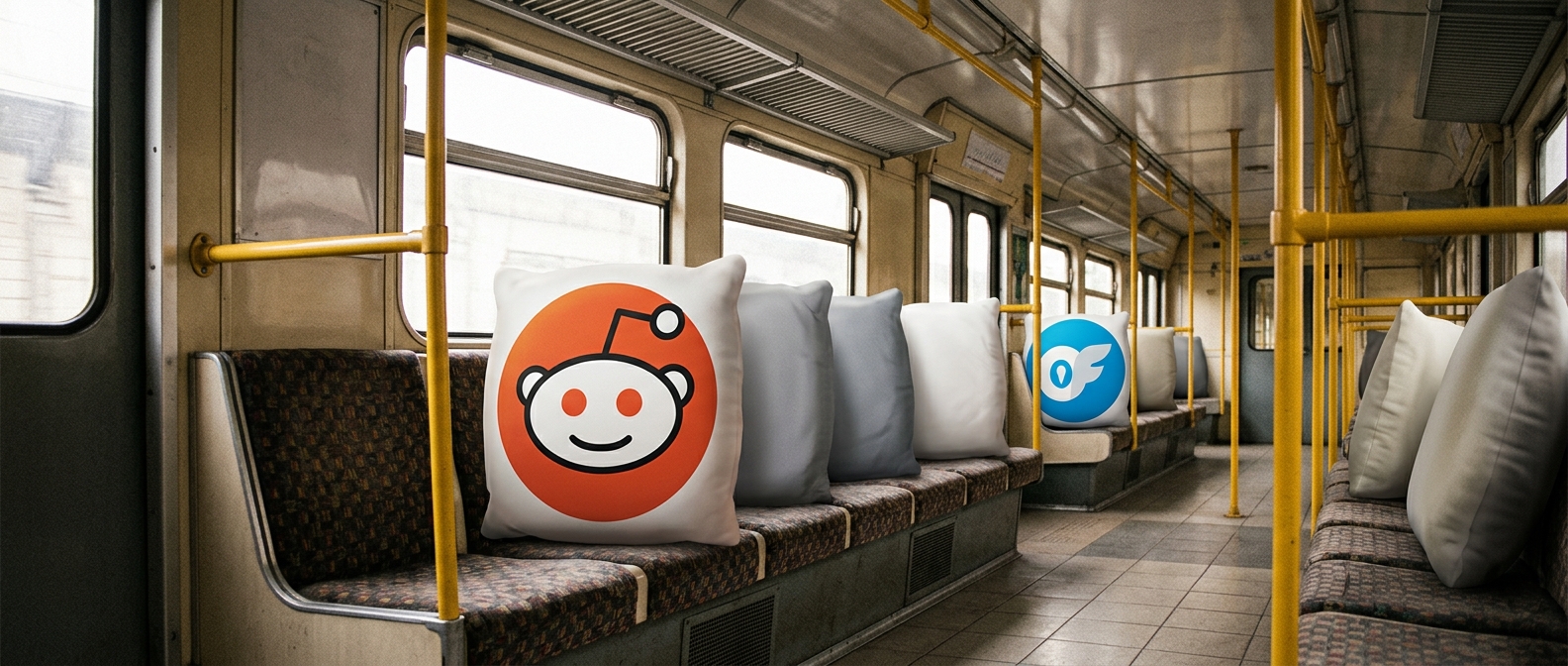 A banner for a blog post of Reddit icon in a metro wagon with lots of blank icons but one of the icons is the OnlyFans icon. The icons are the ones riding the metro. No people, no text. The icons have